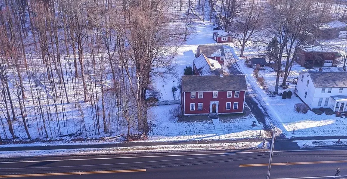 Look at those wide plank floors! Park Holland House, C. 1810 in Massachusetts. $299,900