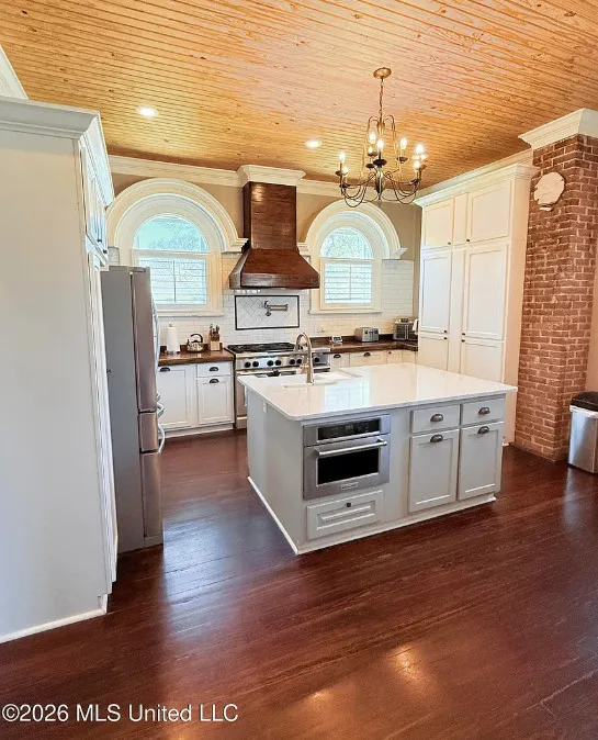 Pretty bathroom and kitchen! Love the outdoor kitchen! C. 1908 in Mississippi. $289,000