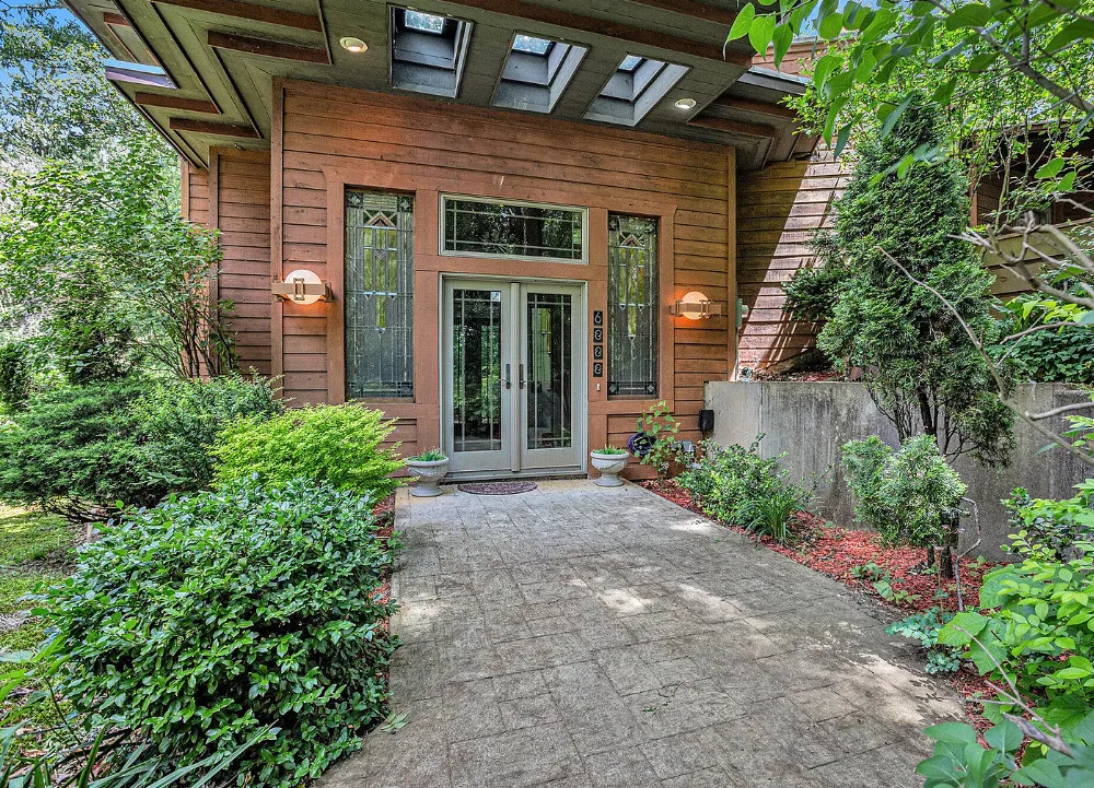 Love this! Student of Frank Lloyd Wright designed this home. 21 acres in Michigan. $599,900