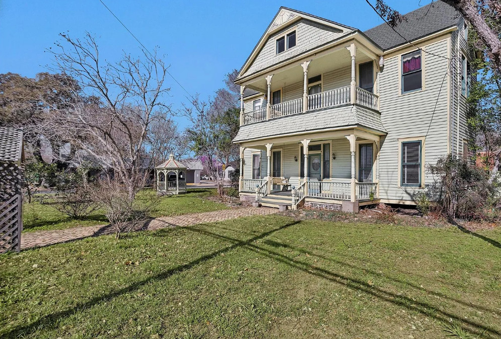 Double Porch Beauty! Stunning Staircase! c. 1898 Texas Home