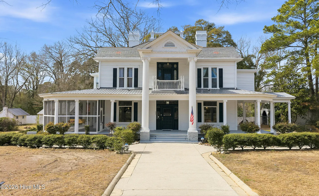 Beautiful! The H. C. Watson House, c. 1883. Over an acre in North Carolina.