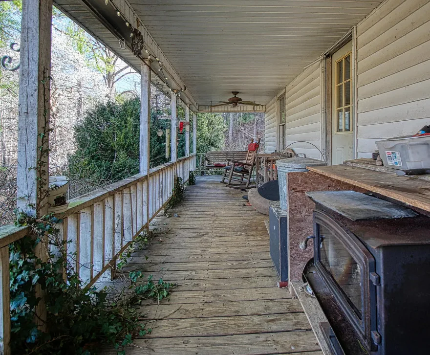 Pretty setting! Almost 15 acres in Virginia. Old country store on the property. $229,900