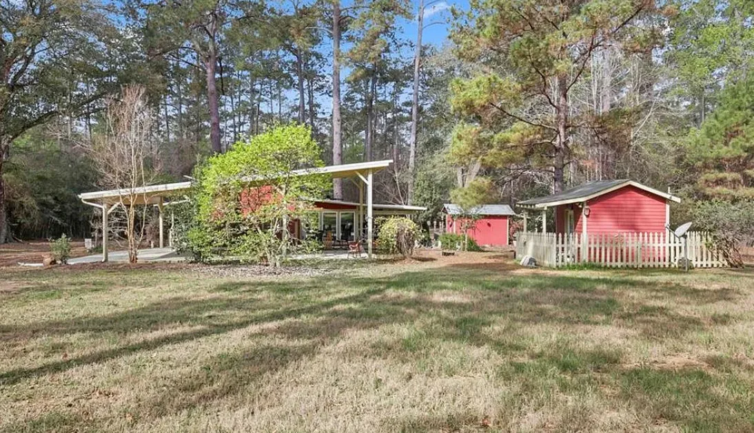 Nice outdoor fireplace! Citrus trees on the property. On 20 acres in Louisiana. $425,000