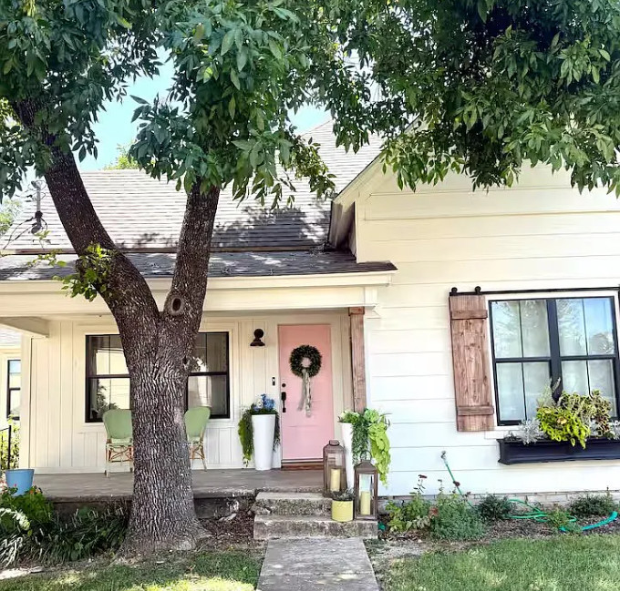 Love the pink door! Interior has a shabby chic feel! C. 1881 in Texas. $320,000