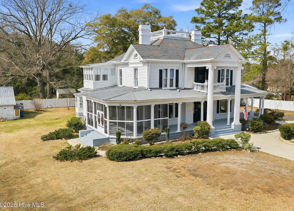 Beautiful! The H. C. Watson House, c. 1883. Over an acre in North Carolina.