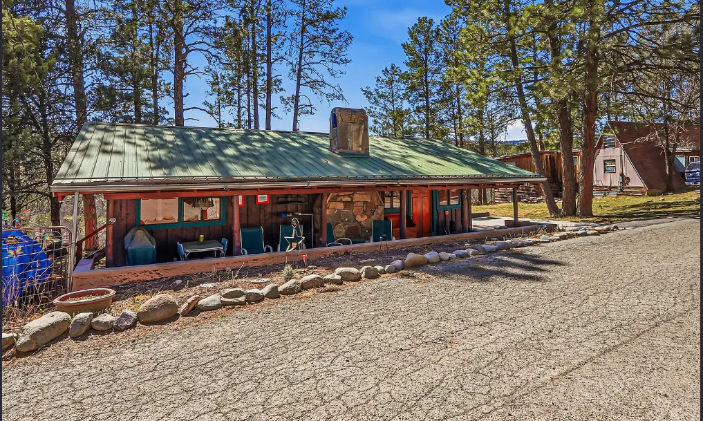 Rustic, but nice interior! Circa 1945 in New Mexico. $199,950