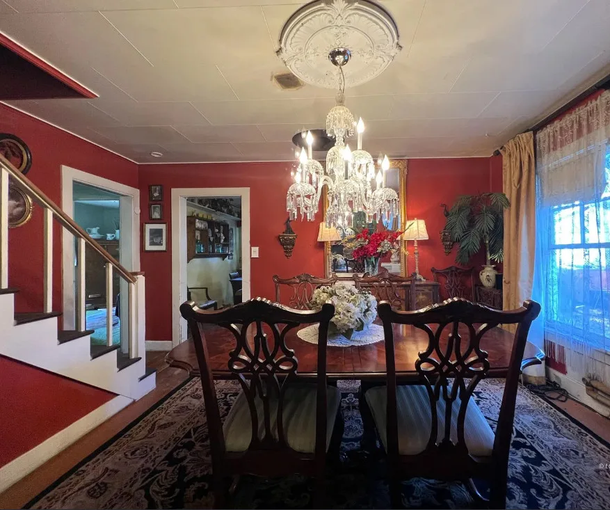 Great wrought iron fence! Pretty mantel! Circa 1940 in Oregon