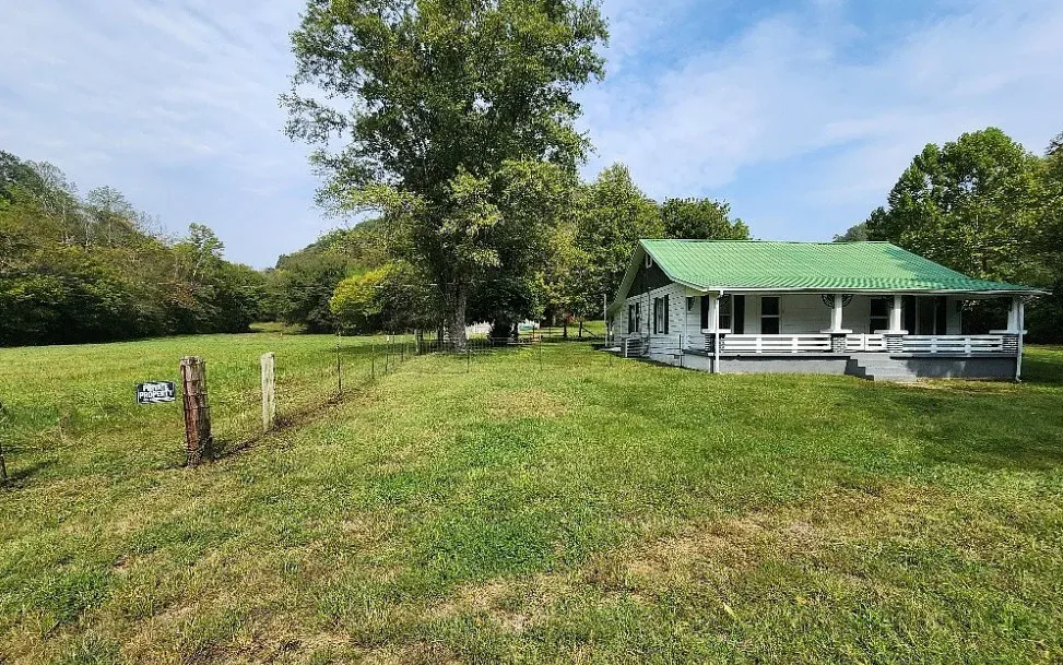 Has a creek! Pretty setting! Almost ten acres in Tennessee