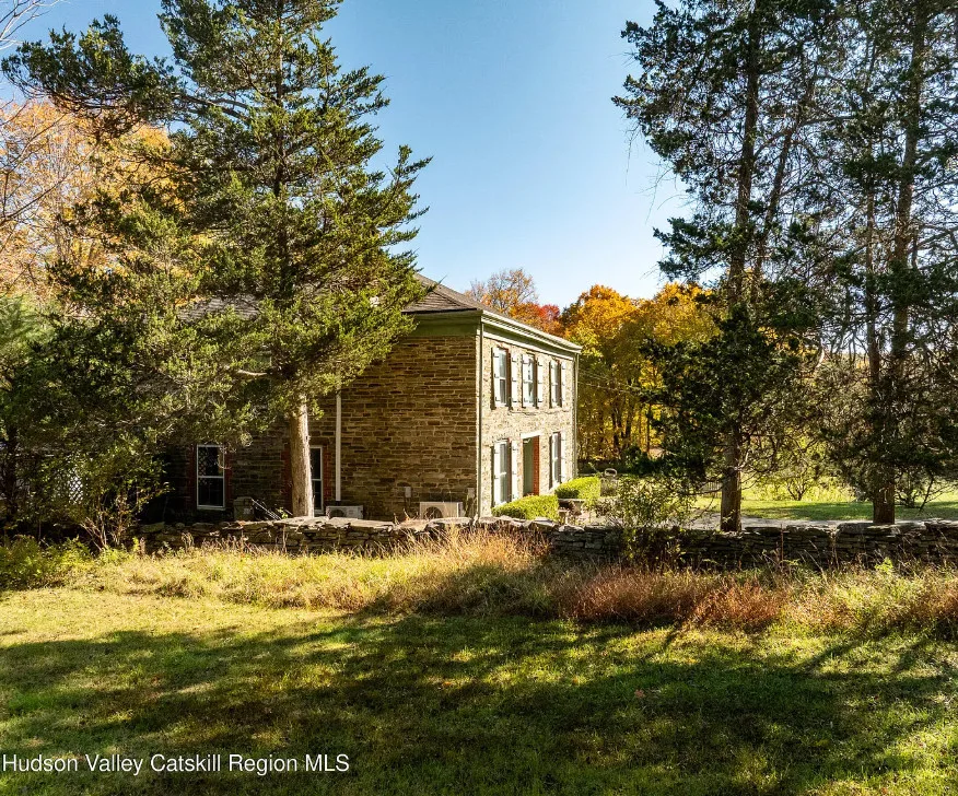 Circa 1820. On 20 acres in New York. Pretty setting!