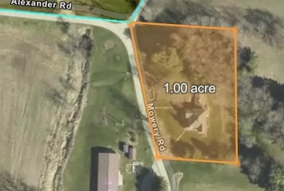 Nice woodwork! Attached greenhouse! One acre in Ohio. $250,000