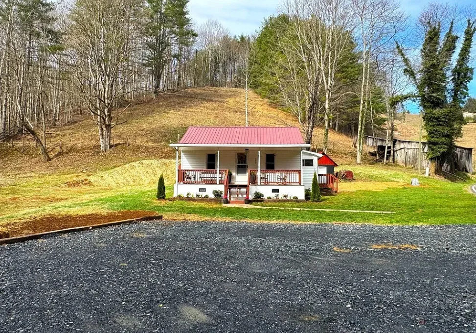 Cute cottage with mountain views and a creek! C. 1941 in NC. $239,000