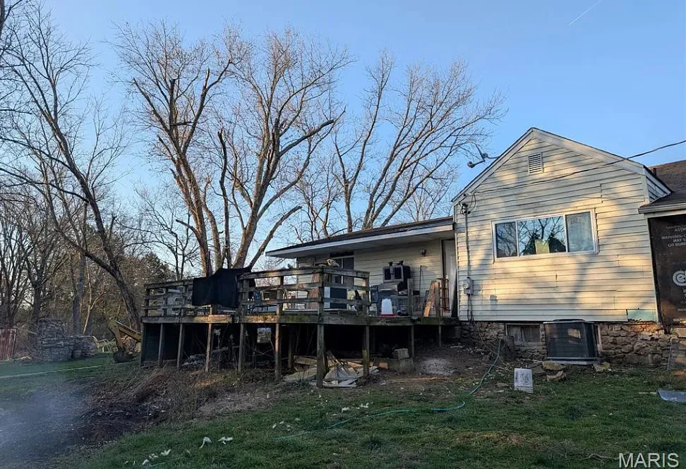 That stone fireplace! Diamond in the Rough! Four acres in Missouri. $100,000