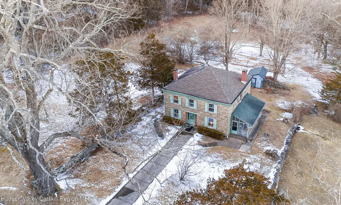 Circa 1820. On 20 acres in New York. Pretty setting! $639,000