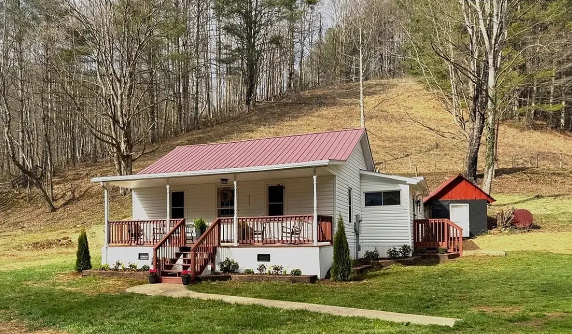 Cute cottage with mountain views and a creek! C. 1941 in NC. $239,000