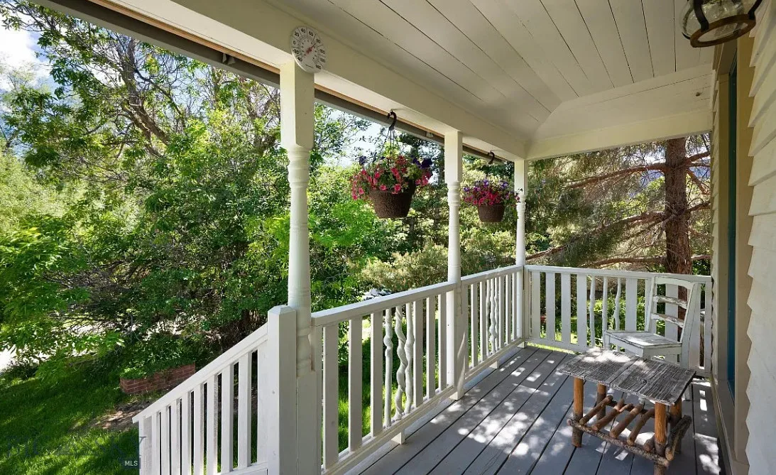 Great interior! That glass sunroom! That sink! C. 1900 in Montana. $445,000