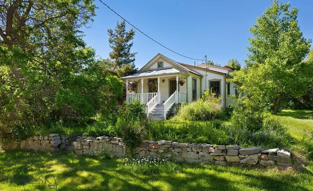 Great interior! That glass sunroom! That sink! C. 1900 in Montana. $445,000