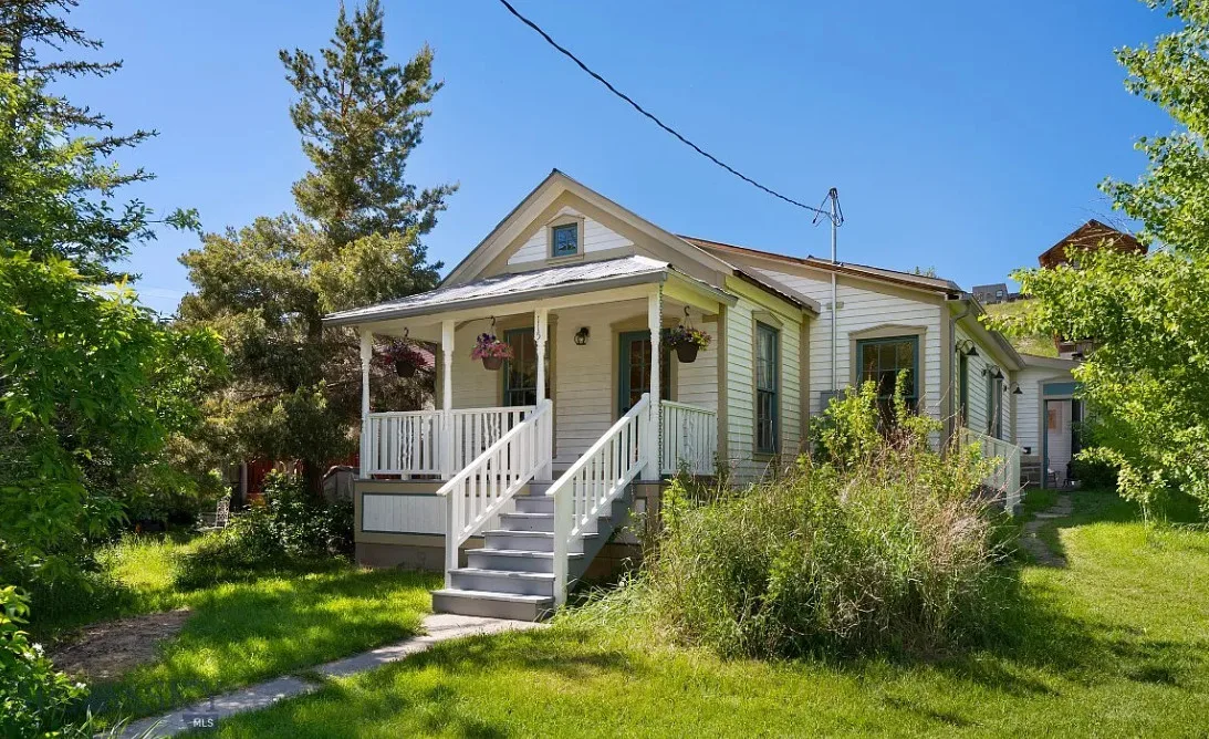 Great interior! That glass sunroom! That sink! C. 1900 in Montana. $445,000