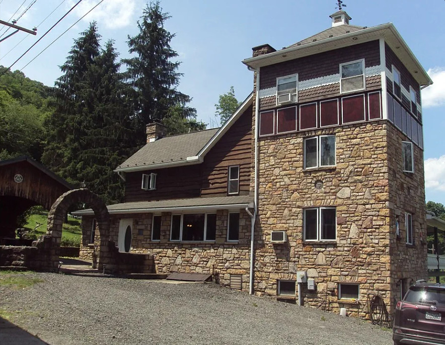 Unique exterior! Love the log cabin! Circa 1910 in Pennsylvania.