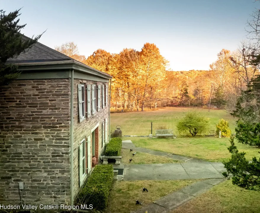 Circa 1820. On 20 acres in New York. Pretty setting! $639,000