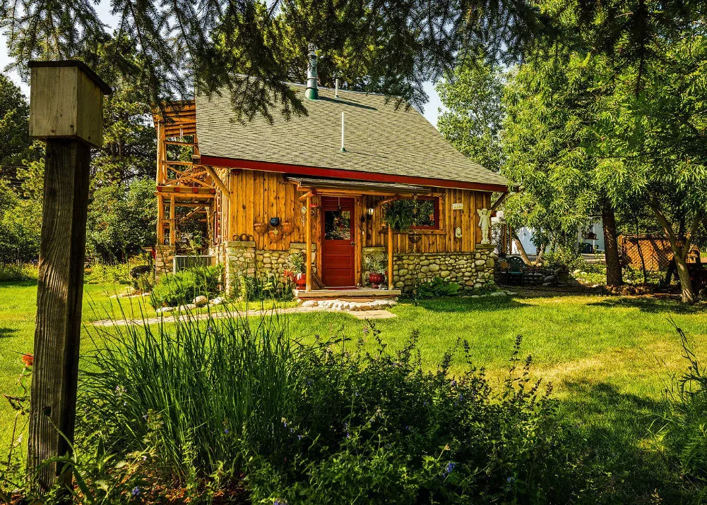 Pretty yard! Rustic cabin, but quaint! C. 1928 in Wyoming.