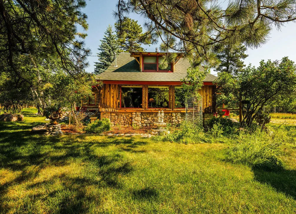 Pretty yard! Rustic cabin, but quaint! C. 1928 in Wyoming.