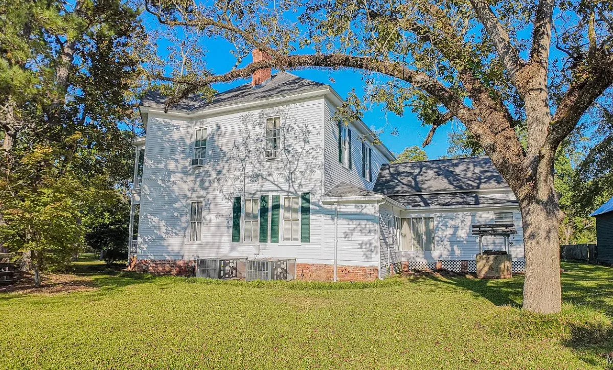 Double porch love! Pretty details! On 16 acres in Alabama.