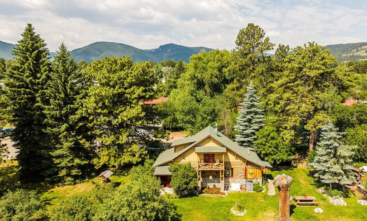 Pretty yard! Rustic cabin, but quaint! C. 1928 in Wyoming.