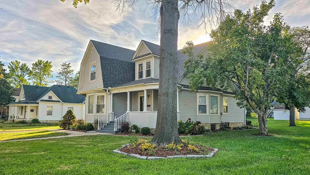 Unpainted woodwork! Pretty tree lined street! Circa 1910 in Kansas.