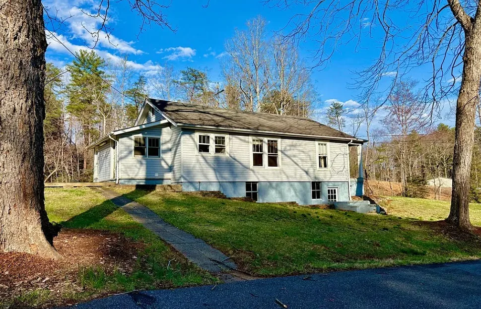 Want this! Love the outbuildings! What a nice retreat this would be! Almost five acres in NC.