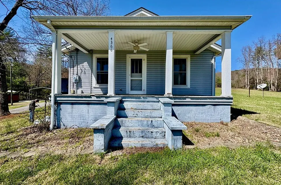 Want this! Love the outbuildings! What a nice retreat this would be! Almost five acres in NC.