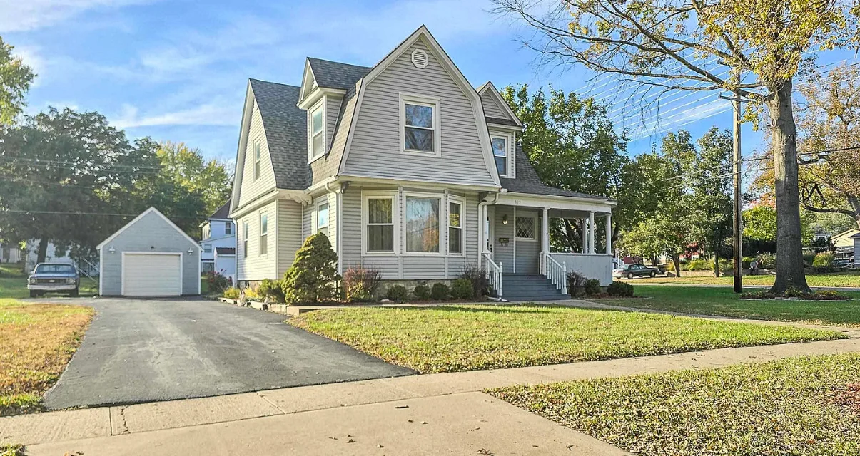 Unpainted woodwork! Pretty tree lined street! Circa 1910 in Kansas.