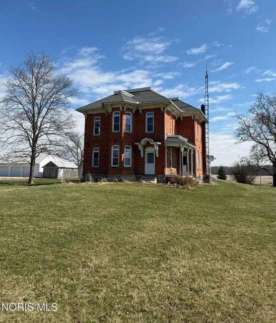 Beautiful setting! Sunflower field and a small apple orchard! Over 5 acres in Ohio.