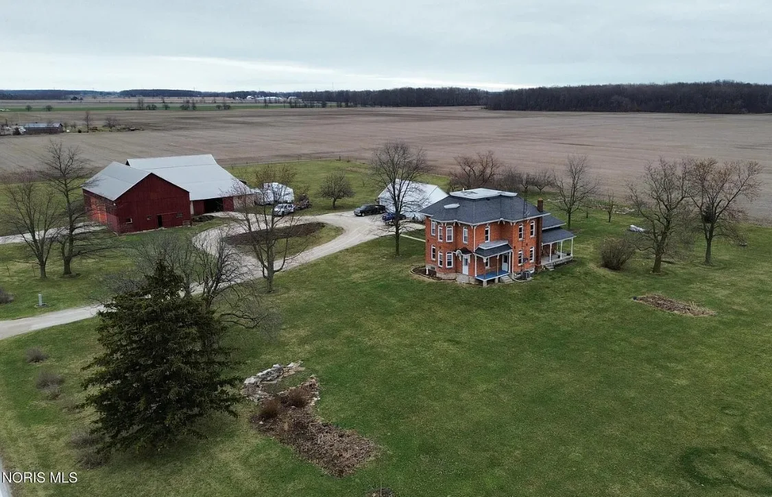 Beautiful setting! Sunflower field and a small apple orchard! Over 5 acres in Ohio.