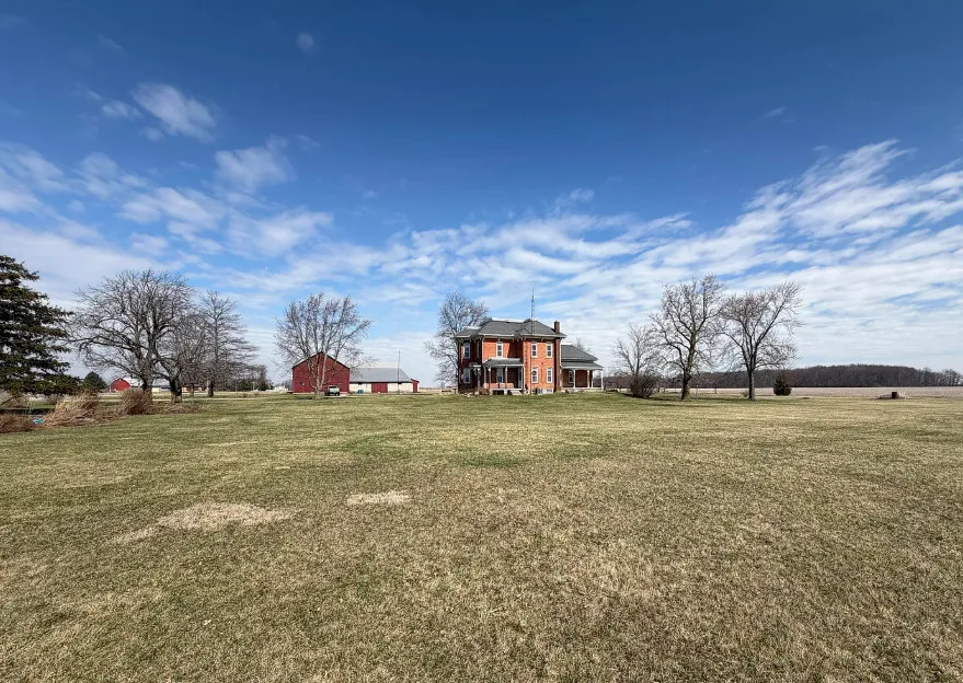 Beautiful setting! Sunflower field and a small apple orchard! Over 5 acres in Ohio.