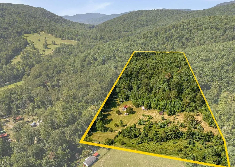 Pretty setting! Over 13 acres in Virginia.