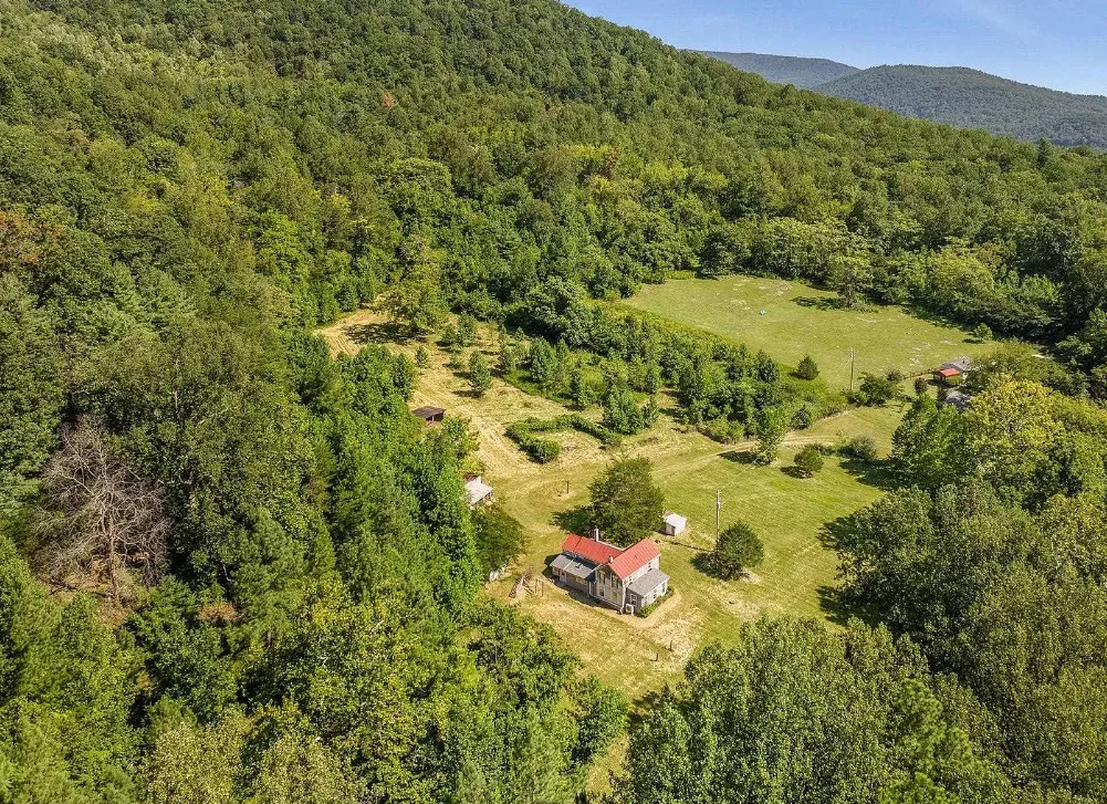 Pretty setting! Over 13 acres in Virginia.