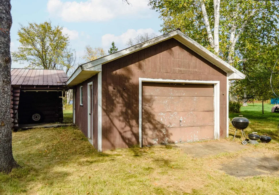 Waterfront in Michigan! Love that stone chimney! C. 1950.