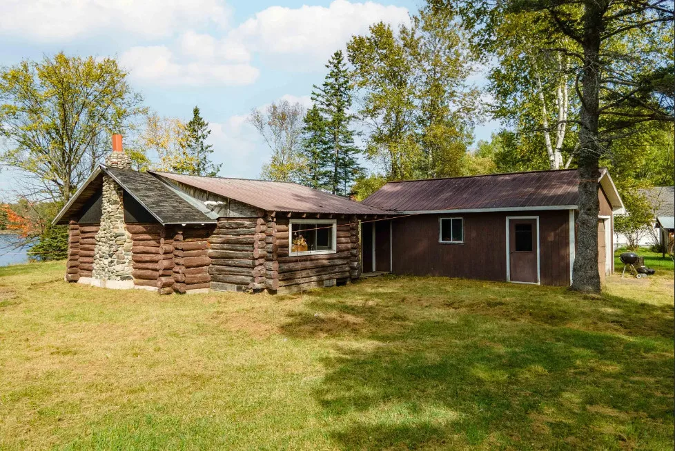 Waterfront in Michigan! Love that stone chimney! C. 1950.