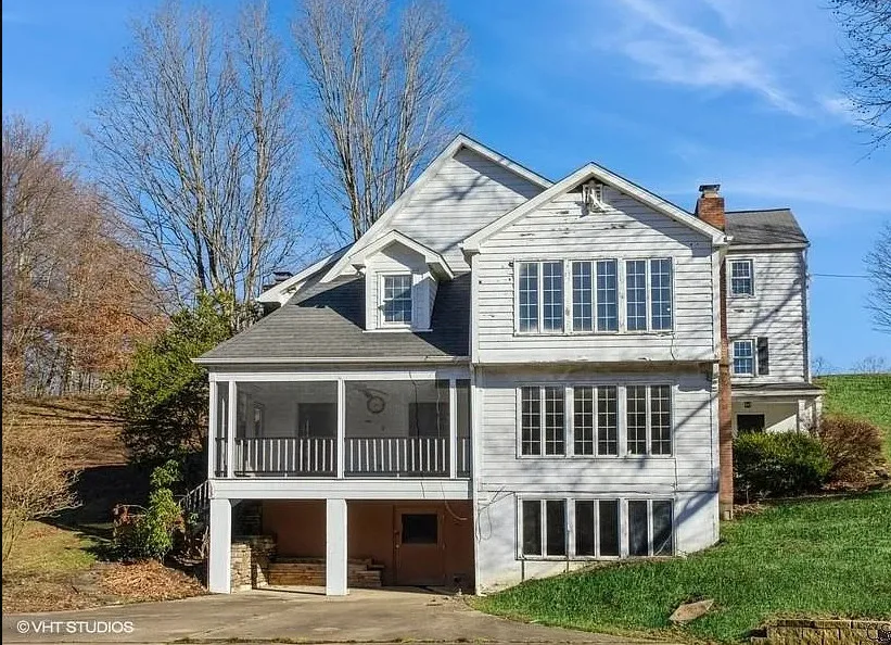 Tennis court and a pool! Huge fireplace! Eight acres in Pennsylvania. $354,900