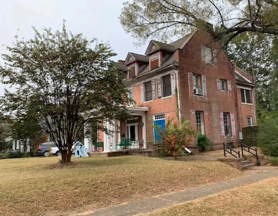 Nice sinks and pocket doors! Circa 1912 in Arkansas. $149,900