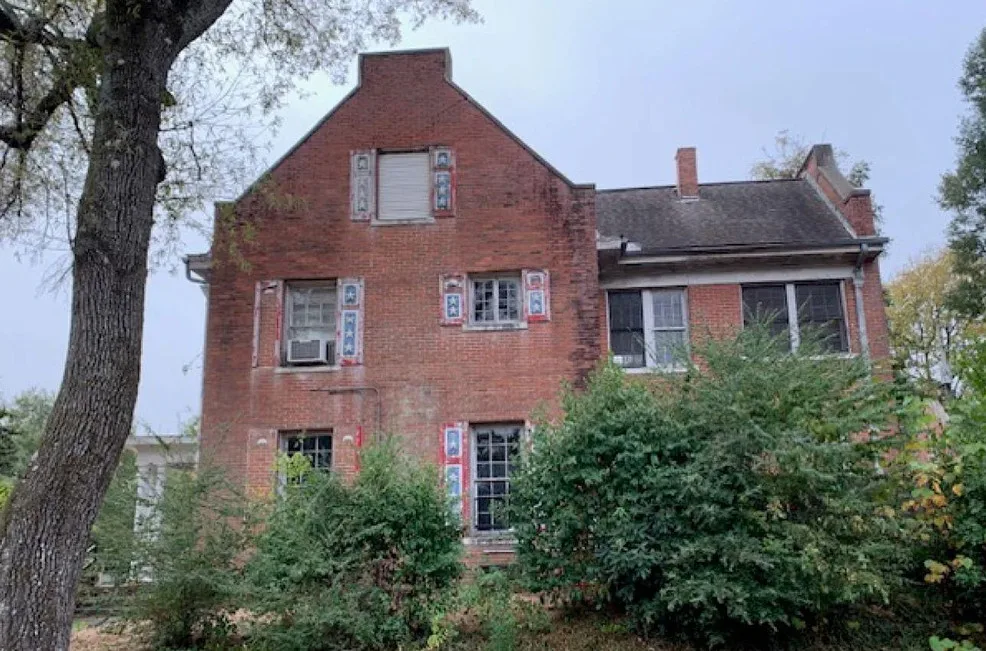 Nice sinks and pocket doors! Circa 1912 in Arkansas. $149,900