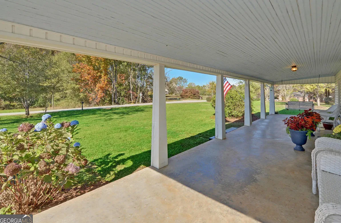 Classic looking farmhouse! Over three acres in Georgia with a huge workshop! 