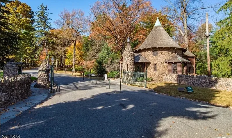 Has an indoor pool! 18 bedrooms/14 bathrooms. Almost six acres in New Jersey. 