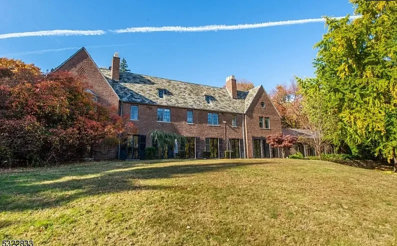 Has an indoor pool! 18 bedrooms/14 bathrooms. Almost six acres in New Jersey. 