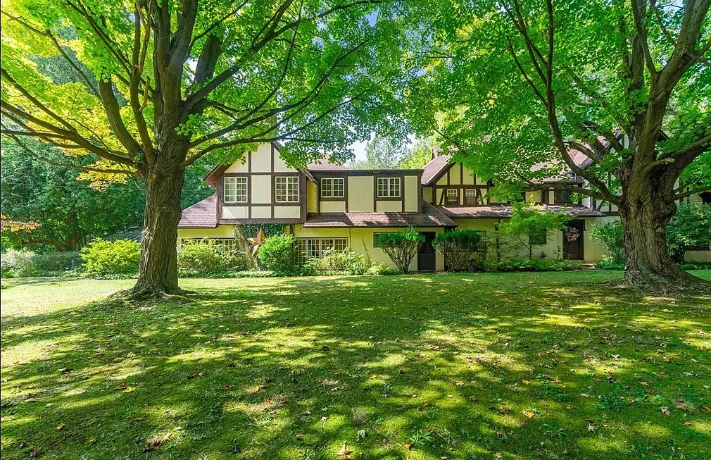 Deal of the Day! Love the private bridge and greenhouse! Over three acres in Ohio