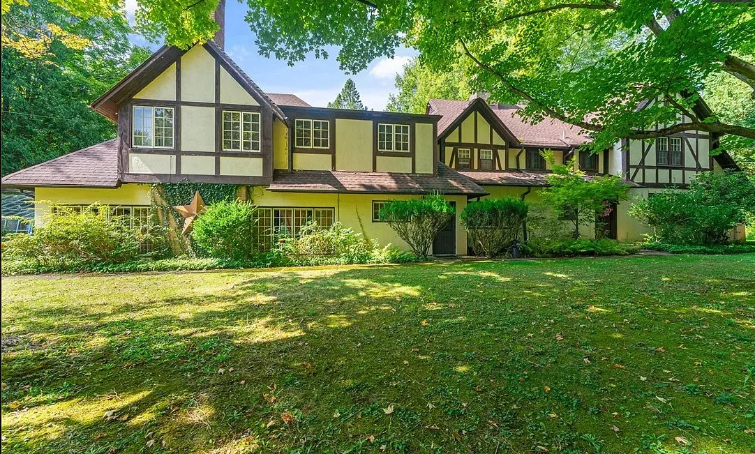 Deal of the Day! Love the private bridge and greenhouse! Over three acres in Ohio