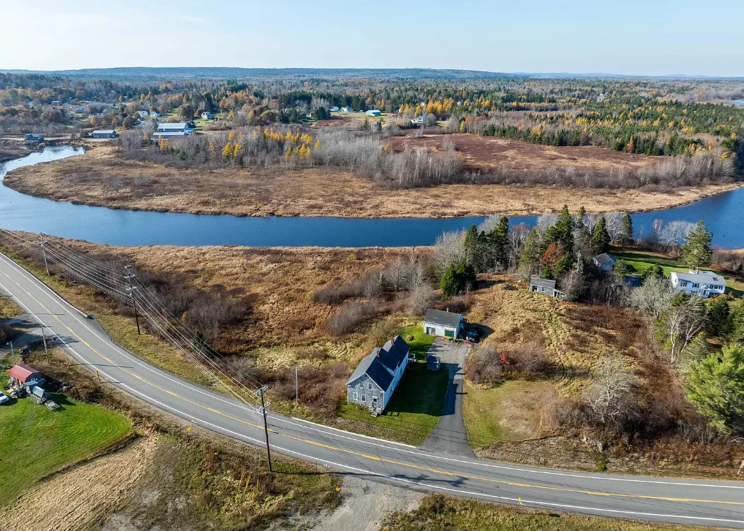 On 52 acres in Maine. Fixer upper alert!