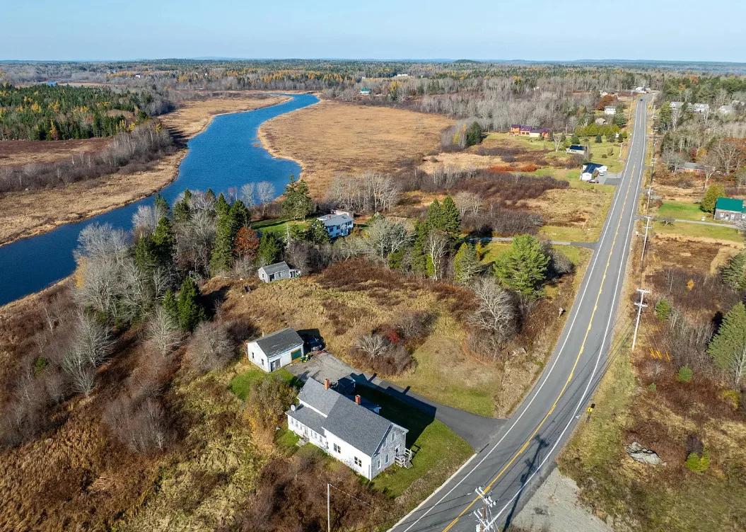 On 52 acres in Maine. Fixer upper alert!