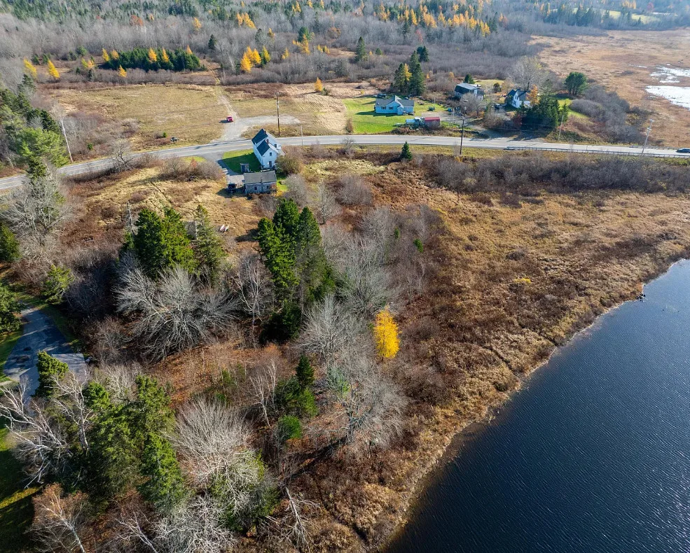 On 52 acres in Maine. Fixer upper alert!