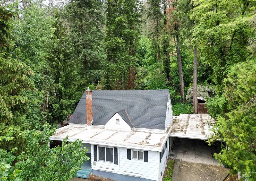 Love the outdoor fireplace! Circa 1937. Over an acre in Idaho